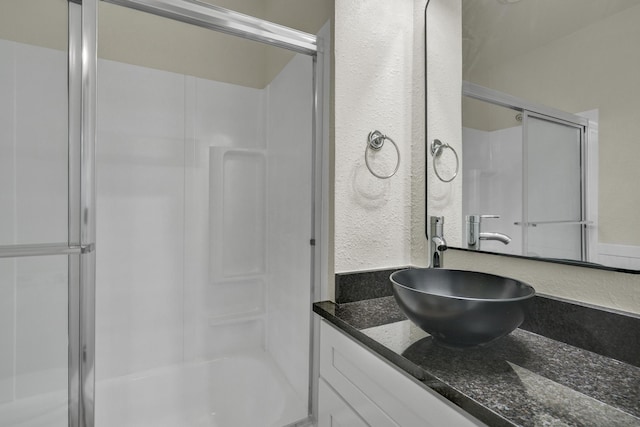 1110 Green St, Abilene, TX 79603 - bathroom featuring a stall shower and vanity