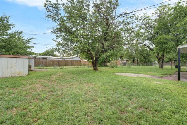 1110 Green St, Abilene, TX 79603 - view of yard with a shed and an outdoor structure