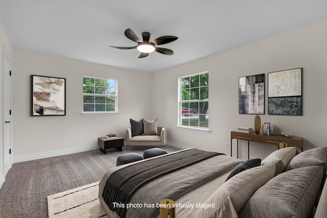 1110 Green St, Abilene, TX 79603 - carpeted bedroom featuring baseboards, multiple windows, and a ceiling fan