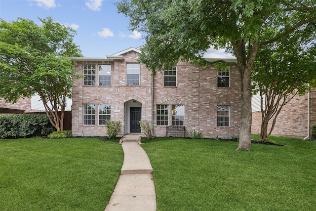 1411 Thistle Cir, Allen, TX 75002 - view of front facade with a front lawn and brick siding