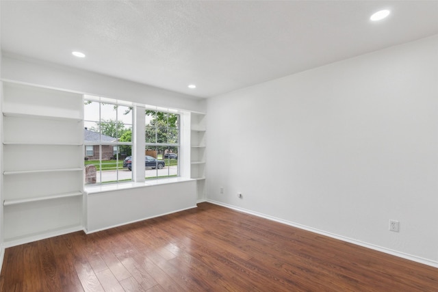 1411 Thistle Cir, Allen, TX 75002 - spare room with wood finished floors, recessed lighting, and baseboards