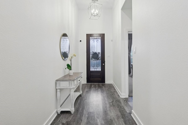 1405 Chickadee Dr, Argyle, TX 76226 - foyer entrance featuring a chandelier, dark wood-style floors, and baseboards