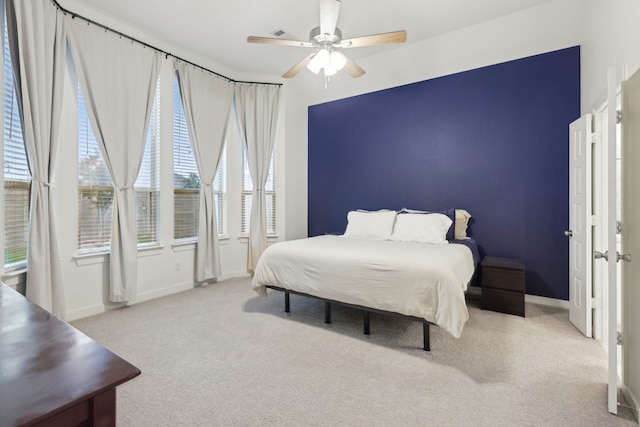 1405 Chickadee Dr, Argyle, TX 76226 - carpeted bedroom with multiple windows, a ceiling fan, and baseboards