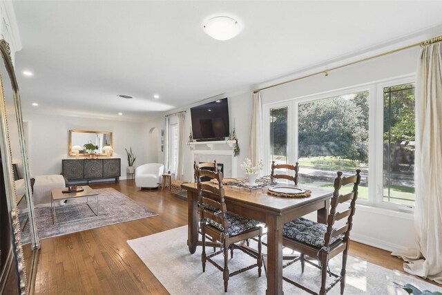 home office with wood finished floors and baseboards