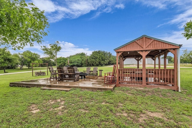 view of home's community featuring a gazebo, a yard, and a wooden deck