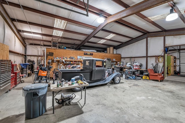 garage with a workshop area
