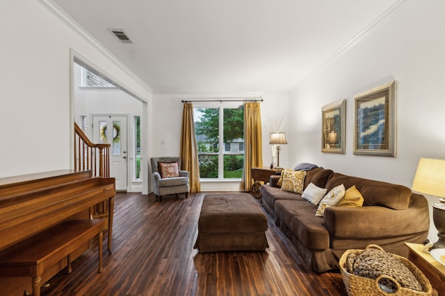 living room featuring crown molding and dark wood finished floors