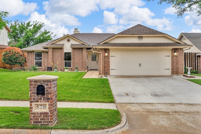 view of front of property featuring brick siding, an attached garage, driveway, and a shingled roof