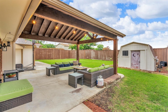 view of patio / terrace featuring an outdoor hangout area, a storage shed, and an outbuilding