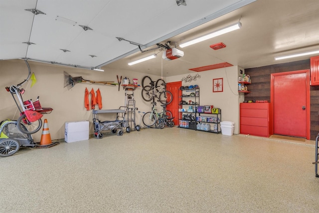 garage featuring a garage door opener