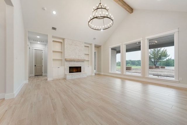 unfurnished living room with light wood-style floors, a chandelier, beamed ceiling, high vaulted ceiling, and baseboards