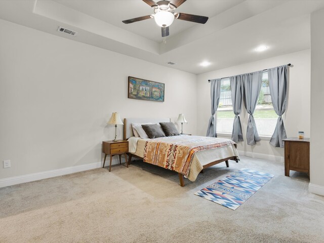 2209 Trace Ridge Dr, Weatherford, TX 76087 - carpeted bedroom with a raised ceiling, baseboards, a ceiling fan, and recessed lighting