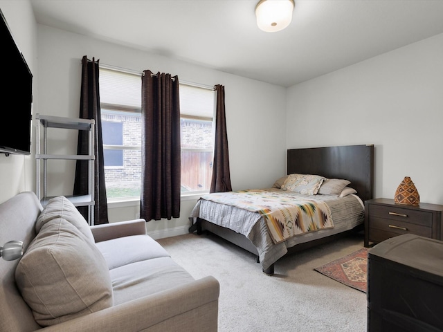 2209 Trace Ridge Dr, Weatherford, TX 76087 - carpeted bedroom featuring multiple windows and baseboards