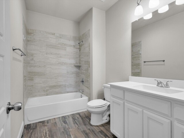 2209 Trace Ridge Dr, Weatherford, TX 76087 - full bath with toilet, vanity, shower / bath combination, and wood finished floors