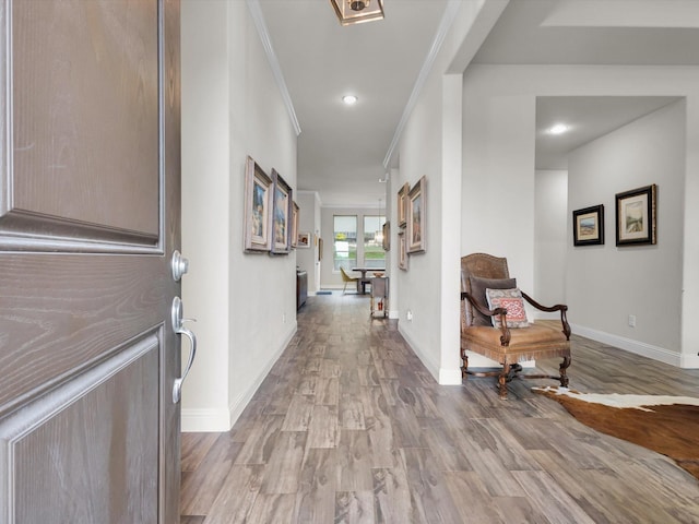 2209 Trace Ridge Dr, Weatherford, TX 76087 - corridor with wood finished floors, baseboards, crown molding, and recessed lighting