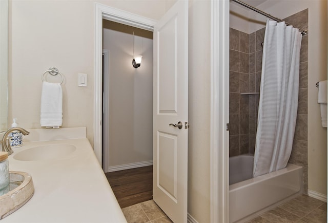 4625 Man O War Rd, Carrollton, TX 75010 - bathroom with shower / bathtub combination with curtain and vanity