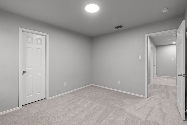 2720 Ocaso Dr, Little Elm, TX 75068 - empty room featuring light colored carpet, baseboards, and a smoke detector