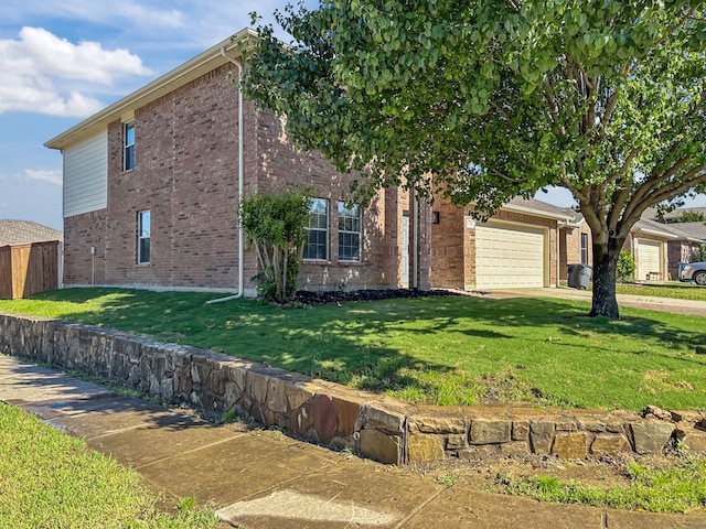 2720 Ocaso Dr, Little Elm, TX 75068 - view of side of property with brick siding, a yard, concrete driveway, and a garage
