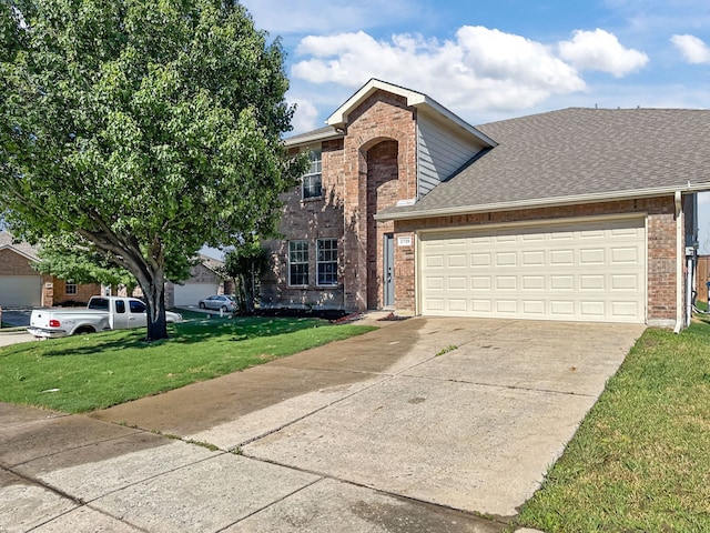 2720 Ocaso Dr, Little Elm, TX 75068 - traditional-style house with brick siding, concrete driveway, a front yard, a garage, and a shingled roof
