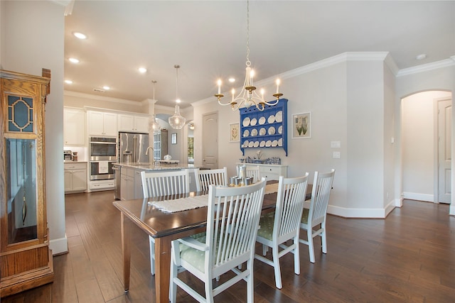 2700 Tremont Blvd, Mckinney, TX 75071 - dining area featuring arched walkways, dark wood-style flooring, a chandelier, recessed lighting, and crown molding