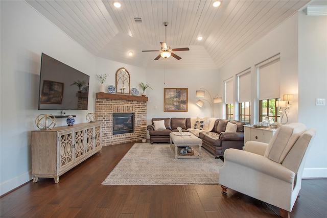 2700 Tremont Blvd, Mckinney, TX 75071 - living area featuring wood ceiling, ceiling fan, baseboards, dark wood-type flooring, and a fireplace