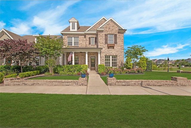 2700 Tremont Blvd, Mckinney, TX 75071 - view of front of home featuring brick siding and a front lawn