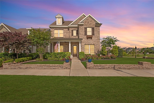 2700 Tremont Blvd, Mckinney, TX 75071 - view of front of house featuring a yard and brick siding