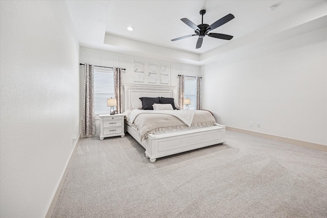 2028 Carrie Ct, Weatherford, TX 76088 - bedroom with light carpet, baseboards, multiple windows, and recessed lighting