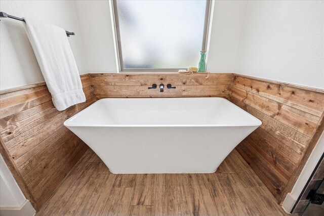 2028 Carrie Ct, Weatherford, TX 76088 - full bath featuring a wainscoted wall and a freestanding tub