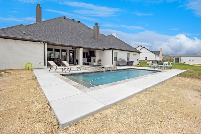 2028 Carrie Ct, Weatherford, TX 76088 - outdoor pool with a patio, an in-ground hot tub, a ceiling fan, and area for grilling