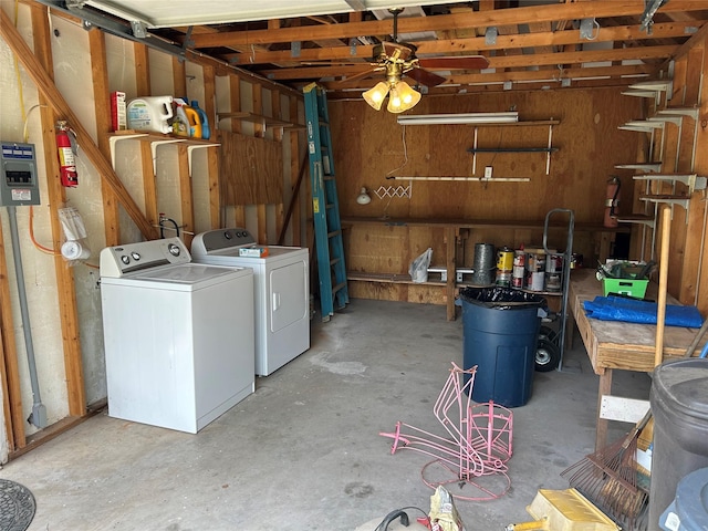120 One Feather, Whitney, TX 76692 - garage featuring ceiling fan and washing machine and clothes dryer