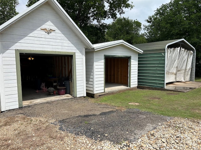 120 One Feather, Whitney, TX 76692 - garage featuring a shed