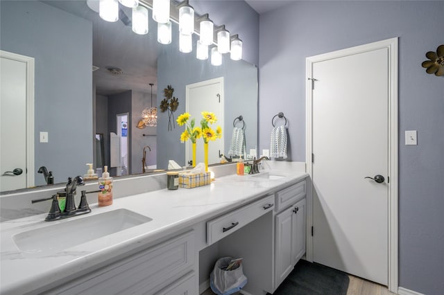bathroom featuring double vanity