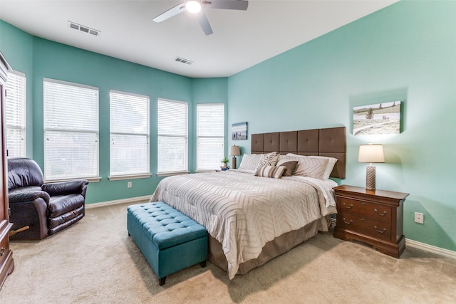 bedroom featuring carpet floors, baseboards, and a ceiling fan