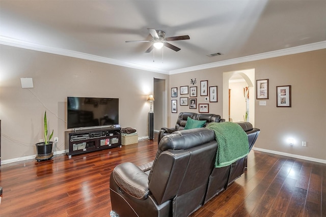 111 Evening Star Cir, Red Oak, TX 75154 - living room featuring arched walkways, ceiling fan, dark wood-type flooring, and ornamental molding