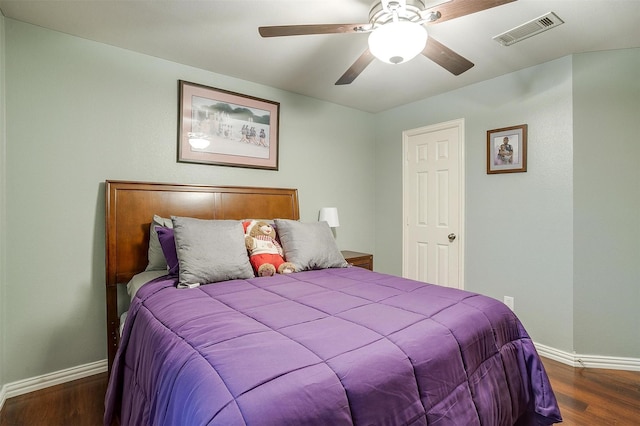 111 Evening Star Cir, Red Oak, TX 75154 - bedroom with baseboards, wood finished floors, and a ceiling fan