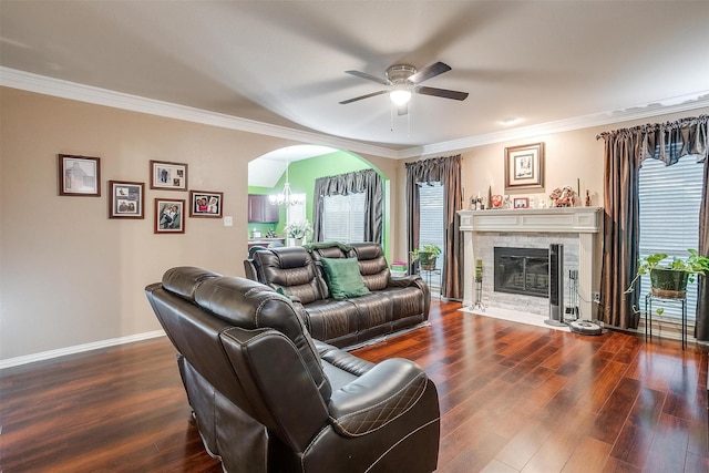 111 Evening Star Cir, Red Oak, TX 75154 - living area with a ceiling fan, arched walkways, dark wood-type flooring, a chandelier, and crown molding