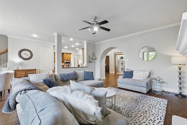 924 Mckamy Dr, Allen, TX 75013 - living room with a ceiling fan, arched walkways, baseboards, crown molding, and recessed lighting