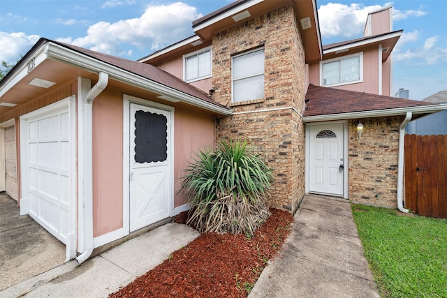 2634 Pinta Cir, Grand Prairie, TX 75052 - view of front of property with roof with shingles, an outbuilding, and fence