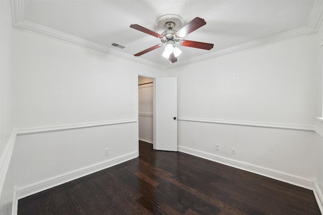 2634 Pinta Cir, Grand Prairie, TX 75052 - spare room featuring wood finished floors, baseboards, a ceiling fan, ornamental molding, and a textured ceiling