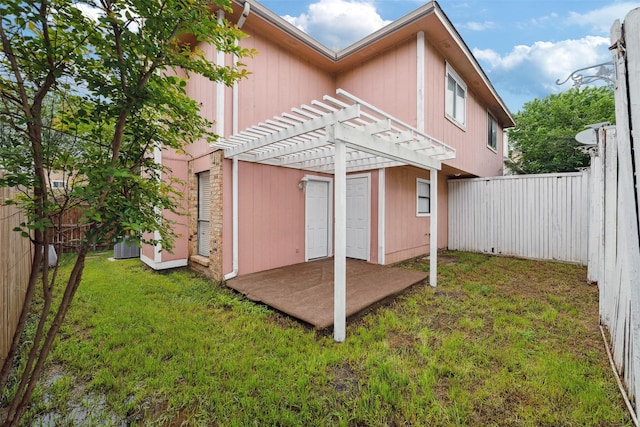 2634 Pinta Cir, Grand Prairie, TX 75052 - back of property featuring a pergola and a patio area