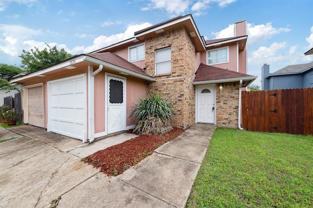 2634 Pinta Cir, Grand Prairie, TX 75052 - traditional-style home with roof with shingles, driveway, an attached garage, and a chimney