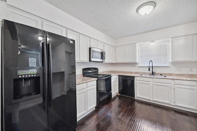 2634 Pinta Cir, Grand Prairie, TX 75052 - kitchen featuring black appliances, a sink, a textured ceiling, dark wood-style flooring, and white cabinets