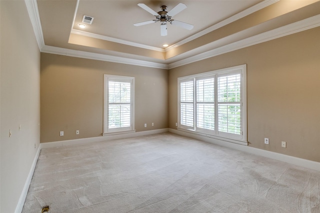 2813 Welborn St, Dallas, TX 75219 - empty room with crown molding, light carpet, a tray ceiling, a ceiling fan, and baseboards