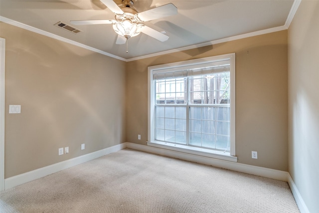2813 Welborn St, Dallas, TX 75219 - spare room with light colored carpet, ornamental molding, a ceiling fan, and baseboards