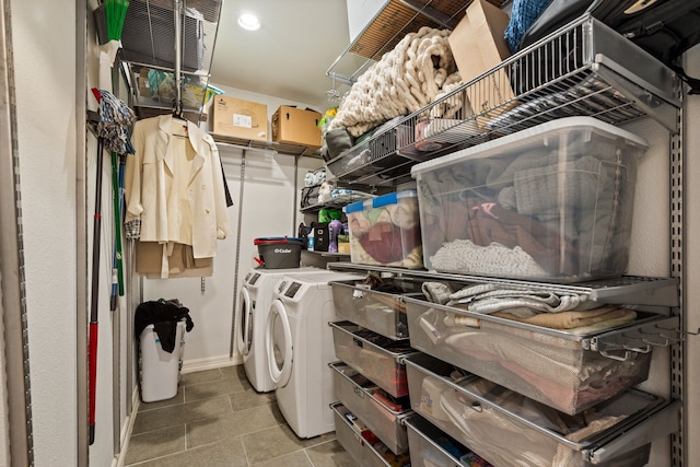 3208 Cole Ave Unit 2304, Dallas, TX 75204 - washroom with separate washer and dryer and light tile patterned flooring