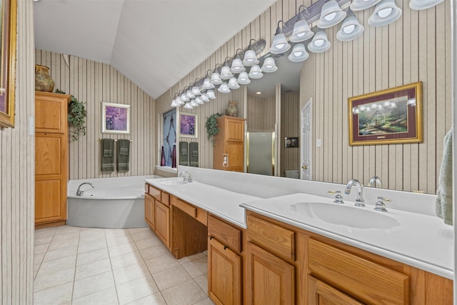 4119 Timbersedge Trl, Arlington, TX 76015 - full bathroom with wallpapered walls, vaulted ceiling, tile patterned flooring, a garden tub, and double vanity