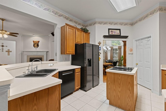 4119 Timbersedge Trl, Arlington, TX 76015 - kitchen with black appliances, a sink, a kitchen island, a ceiling fan, and light tile patterned flooring