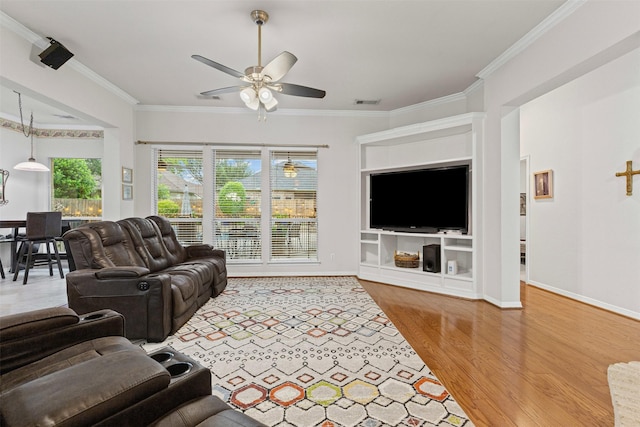 4119 Timbersedge Trl, Arlington, TX 76015 - living area featuring ornamental molding, a ceiling fan, wood finished floors, and baseboards