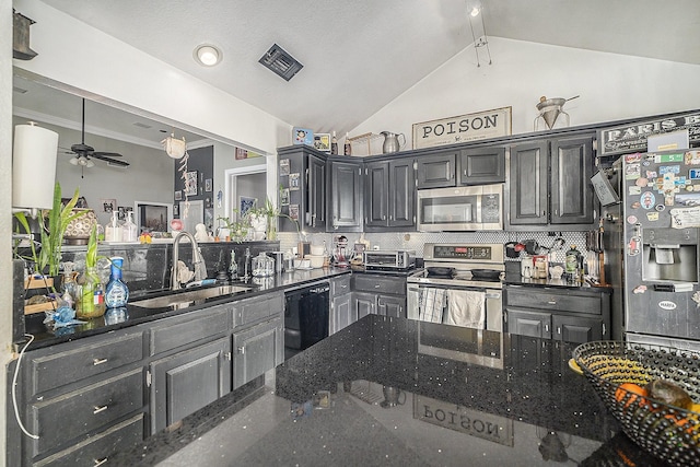 7508 Lake Highlands Dr, Fort Worth, TX 76179 - kitchen featuring appliances with stainless steel finishes, a sink, ceiling fan, tasteful backsplash, and dark stone countertops
